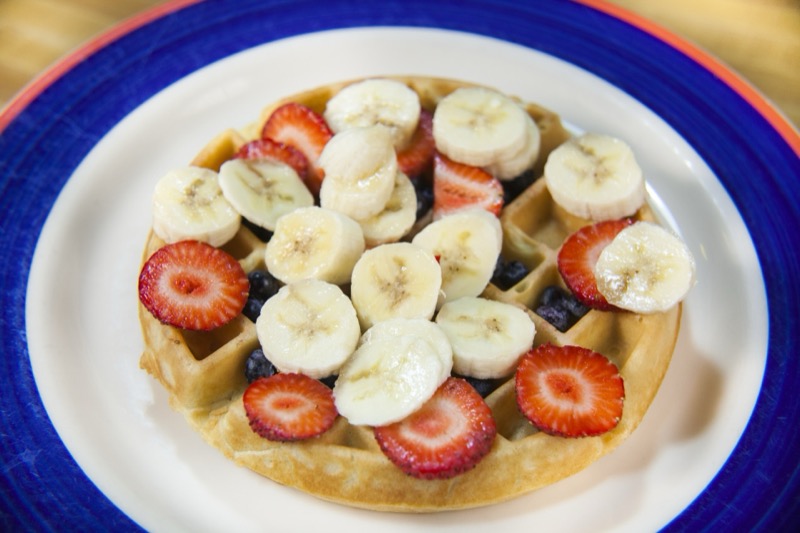 Fresh fruit waffle with strawberries and blueberries at State Street Grill